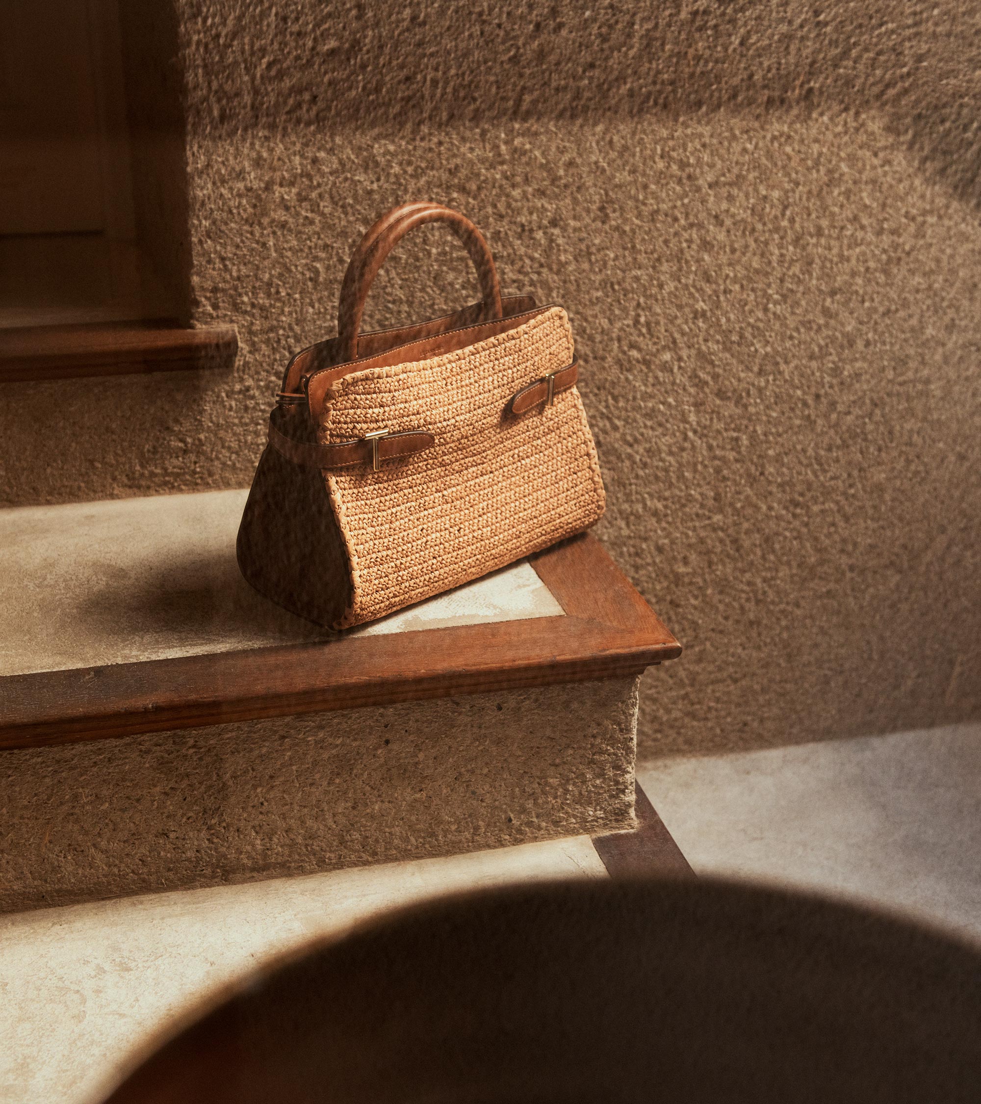 Emie medium handbag in raffia effect and smooth leather